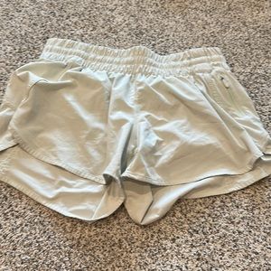 Lightly worn light green lululemon shorts